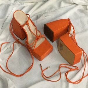 Orange strap platform heels